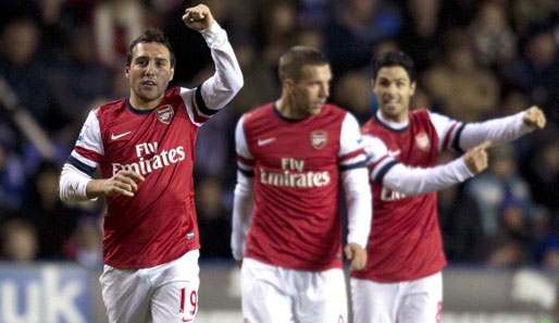 Santi Cazorla (l.) und Lukas Podolski (M.) waren die überragenden Akteure bei Arsenals Sieg