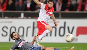 Bald nur noch im Training Gegenspieler: Mergim Mavraj (u.) und Kölns Patrick Helmes
