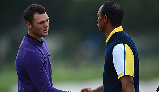 Martin Kaymer (l.) und Tiger Woods wissen jetzt, mit wem sie in das Masters-Turnier starten