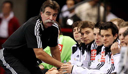 Heiner Brand (l.) hört 2013 als Bundestrainer auf