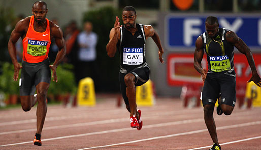 Tyson Gay (M.) fehlten zum Weltrekord von Usain Bolt lediglich acht Hundertstelsekunden