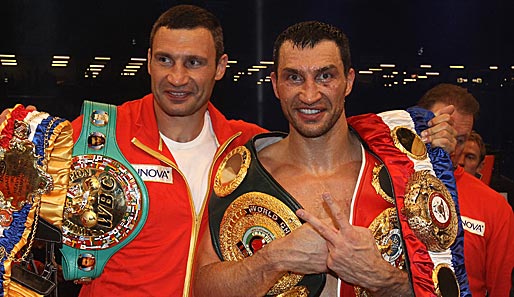 Witali (l.) und Wladimir Klitschko können trotz einer Regeländerung nicht mehr an Olympia teilnehmen
