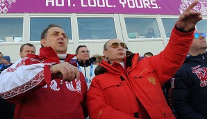 Wladimir Putin und sein umstrittener Sportminister Witali Mutko (l.)