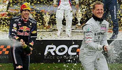 Michael Schumacher und Sebastian Vettel feiern den Sieg im Nations Cup des Race of Champions