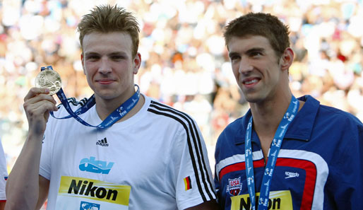 Paul Biedermann (l.) und Michael Phelps werden in Berlin nicht gegeneinander schwimmen
