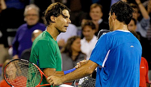 Rafael Nadal (l.) musste sich beim Turnier in Montreal Ivan Dodig geschlagen geben