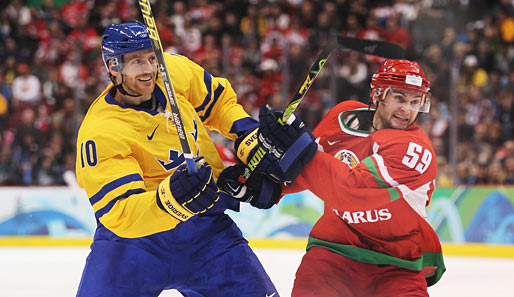 Henrik Tallinder (l.) und seine Schweden mussten gegen Weißrussland hart für den Erfolg arbeiten