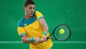 RIO DE JANEIRO, BRAZIL - AUGUST 06: Thanasi Kokkinakis of Australia in action against Elias Gastao of Portugal in the men's first round on Day 1 of the Rio 2016 Olympic Games at the Olympic Tennis Centre on August 6, 2016 in Rio de Janeiro, Brazil. ...