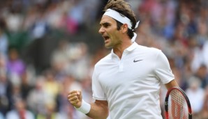 LONDON, ENGLAND - JULY 04: Roger Federer of Switzerland celebrates victory during the Men's Singles fourth round match against Steve Johnson of The United States on day seven of the Wimbledon Lawn Tennis Championships at the All England Lawn Tennis ...