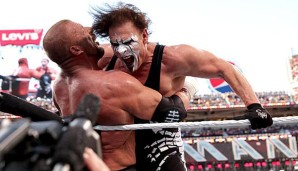 Sting (r.) musste sich Triple H geschlagen geben