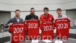 Thomas Müller und Jerome Boateng bleiben dem FC Bayern langfristig erhalten