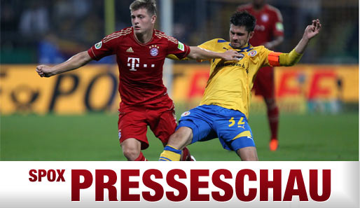 Bayern Münchens Toni Kroos (l.) lässt in dieser Saison nicht nur Dennis Kruppke (r.) hinter sich