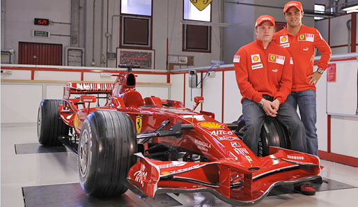 Kimi Räikkönen (l.) und Felipe Massa
