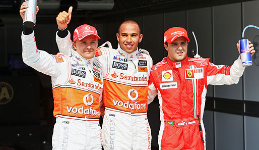 Sein McLaren-Mercedes-Teamkollege Heikki Kovalainen (links) startet als Zweiter