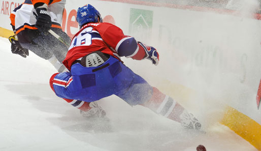 Bremsmanöver von Montreals Matt D'Agostini. Seine Canadiens gewannen mit 3:2 gegen die NY Islanders