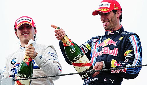 Neben Button fast schon eine Randnotiz: Mark Webber schnappte sich beim Brasilien-GP den Sieg vor Noch-BMW-Pilot Robert Kubica (l.)