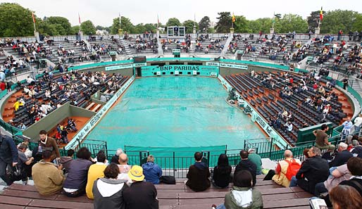 5. TAG: Land unter in Roland Garros. Aufgrund des starken Regens wurde kaum Tennis gespielt. Erst am Nachmittag ging es einigermaßen