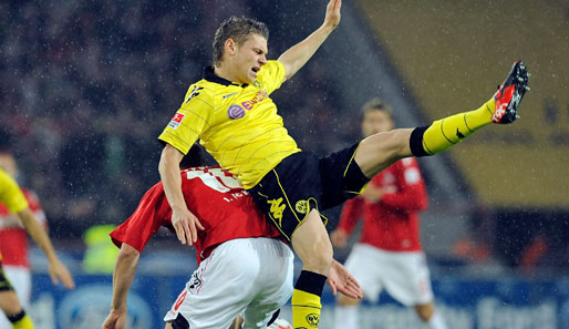 1. FC Köln - Borussia Dortmund 1:2: In Köln ging's von Beginn an heiß her. Da geraten auch mal zwei Namensvetter aneinander. Der doppelte Lukas: Podolski und Piszczek