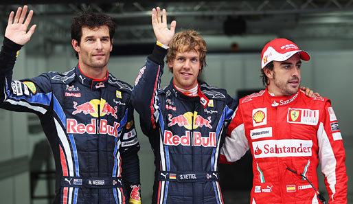 Ähnliches Bild am Sonntag? Sebastian Vettel (M.) wird nach seinem Quali-Sieg beim GP in Südkorea von Mark Webber (l.) und Fernando Alonso eingerahmt