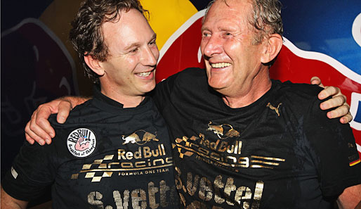 Auch die Macher der beiden Red-Bull-Titel feierten: Teamchef Christian Horner und Berater und Mastermind Helmut Marko. Beide hatten sogar schon Vettel-Shirts