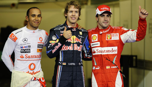 Vor dem großen Start in Abu Dhabi. Noch zeigt der Finger bei Sebastian Vettel und Fernando Alonso (r.) nach oben. Wer wird Weltmeister?