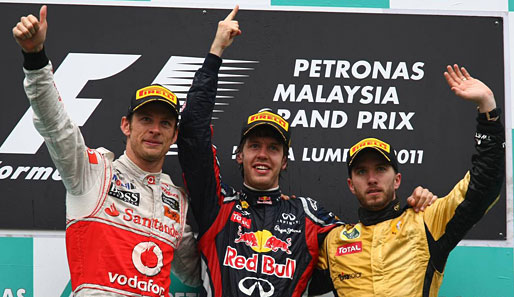 Die Sieger des Malaysia-GP: Vettel (M.) fuhr nach dem Sieg in Melbourne wieder auf Platz eins. Zweiter wurde Button (l.). Überraschend auf dem Podium: Nick Heidfeld