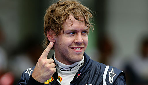 Sebastian Vettel freut sich nach dem Qualifying zum Malaysia-GP über seine zweite Pole-Position im zweiten Saisonrennen