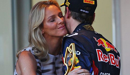 MONACO-GP: Sebastian Vettel holte sich den Siegerkuss der zukünftigen Fürstin Charlene ab. Es war sein erster Sieg im Fürstentum