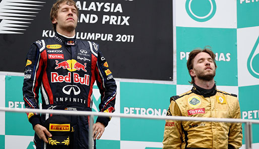 MALAYSIA-GP: Welch Andacht zur Feier des Tages! In Sepang gab es das einzige Podium mit zwei Deutschen. Sebastian Vettel gewann, Nick Heidfeld wurde Dritter