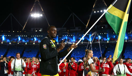 Usain Bolt übt sich beim Einlauf schon mal in Siegerposen
