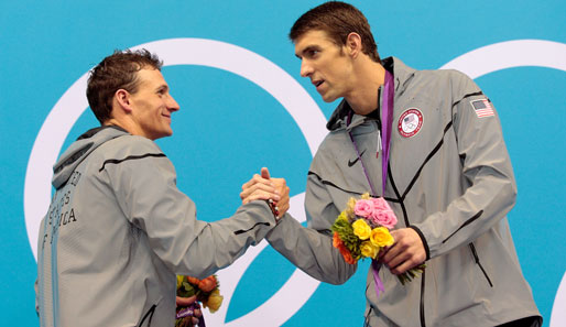Man kennt sich: Ryan Lochte (l.) und Michael Phelps