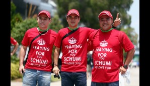 Drei Ferrari-Fans demonstrierten ihre Zuneigung zu Michael Schumacher. #GetWellSoonSchumi!