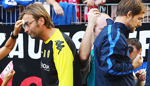 Mainz - Dortmund 1:2: Ob er schon wusste, dass es schweißtreibend wird? Nein, BVB-Trainer Jürgen Klopp und sein Mainzer Kollege Tuchel werden fürs TV aufgehübscht