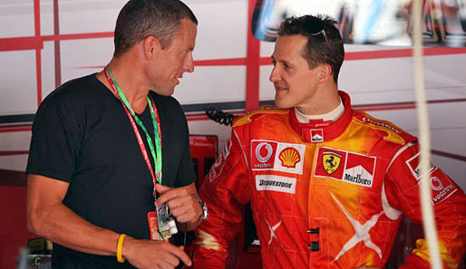 Lance Armstrong (l.) besuchte Michael Schumacher beim Monaco-GP 2006
