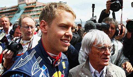 Bernie Ecclestone (r.) setzt auf Red-Bull-Pilot Sebastian Vettel (l.)