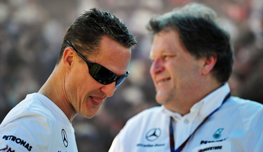 Norbert Haug (r.) gibt sich in Sachen Michael Schumacher optimistisch