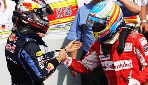Für Fernando Alonso (rechts) zählt Sebastian Vettel nicht zu den WM-Favoriten