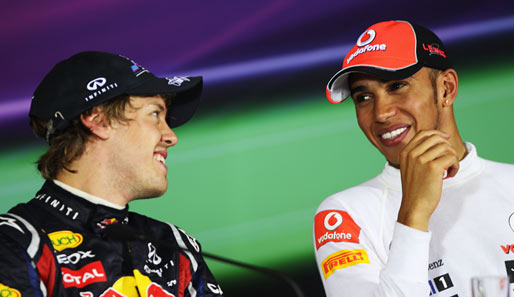 Für Lewis Hamilton (r.) ist Sebastian Vettel der verdiente Weltmeister