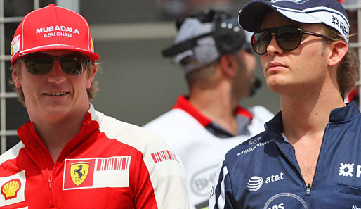 Nico Rosberg (r.) und Kimi Räikkönen stehen im Mittelpunkt der Wechselgerüchte