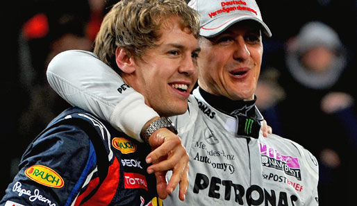 Sebastian Vettel (l.) und Michael Schumacher: ein Herz und eine Seele
