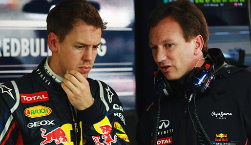 Sebastian Vettel (l.) im Gespräch mit Red Bull-Teamchef Christian Horner