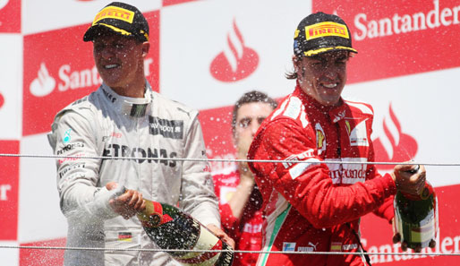 Erstmal seit seinem Comeback durfte Michael Schumacher (l.) wieder auf dem Podium mitfeiern