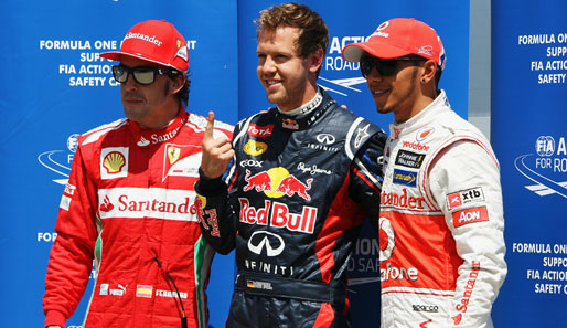 Sebastian Vettel (M.) sicherte sich die Pole-Position vor Fernando Alonso (l.) und Lewis Hamilton