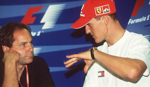 Gerhard Berger (l.) rät Rekordweltmeister Michael Schumacher zum Karriereende