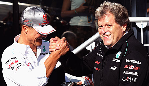 Michael Schumacher (l.) sieht im Ausstieg von Norbert Haug eine "große Zäsur"