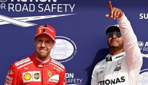 Lewis Hamilton und Sebastian Vettel liefern sich ein Kopf-an-Kopf Rennen