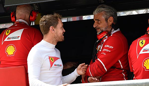 Sebastian Vettel und Ferrari Team Chef Maurizio Arrivabene in Monza