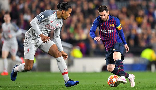 Virgil van Dijk im Duell mit Lionel Messi um den Ballon d'Or