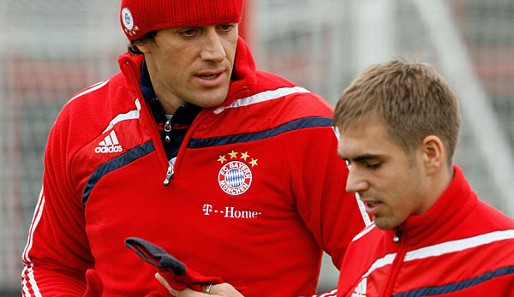 Philipp Lahm (r.) und Luca Toni wurden vom FC Bayern mit Geldstrafen belegt