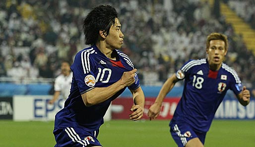 Shinji Kagawa (l.) gewann mit Japan im Januar in Katar den Asien-Cup